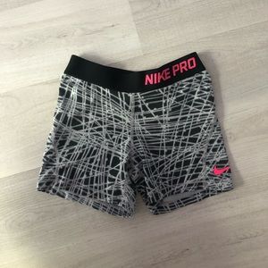 gray/black/pink youth nike pros